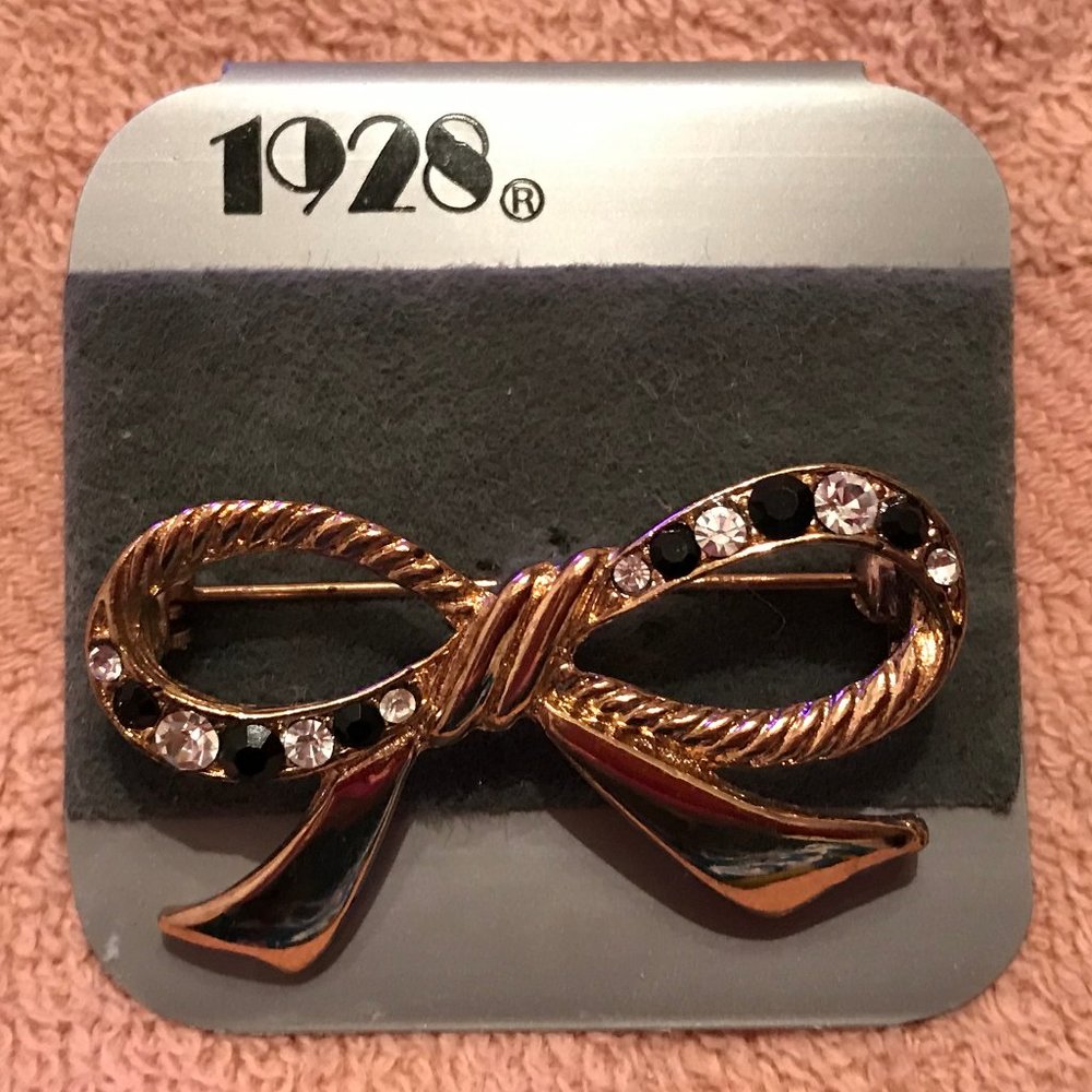 VTG 1928 Gold Bow Pin with Black + Clear Stones